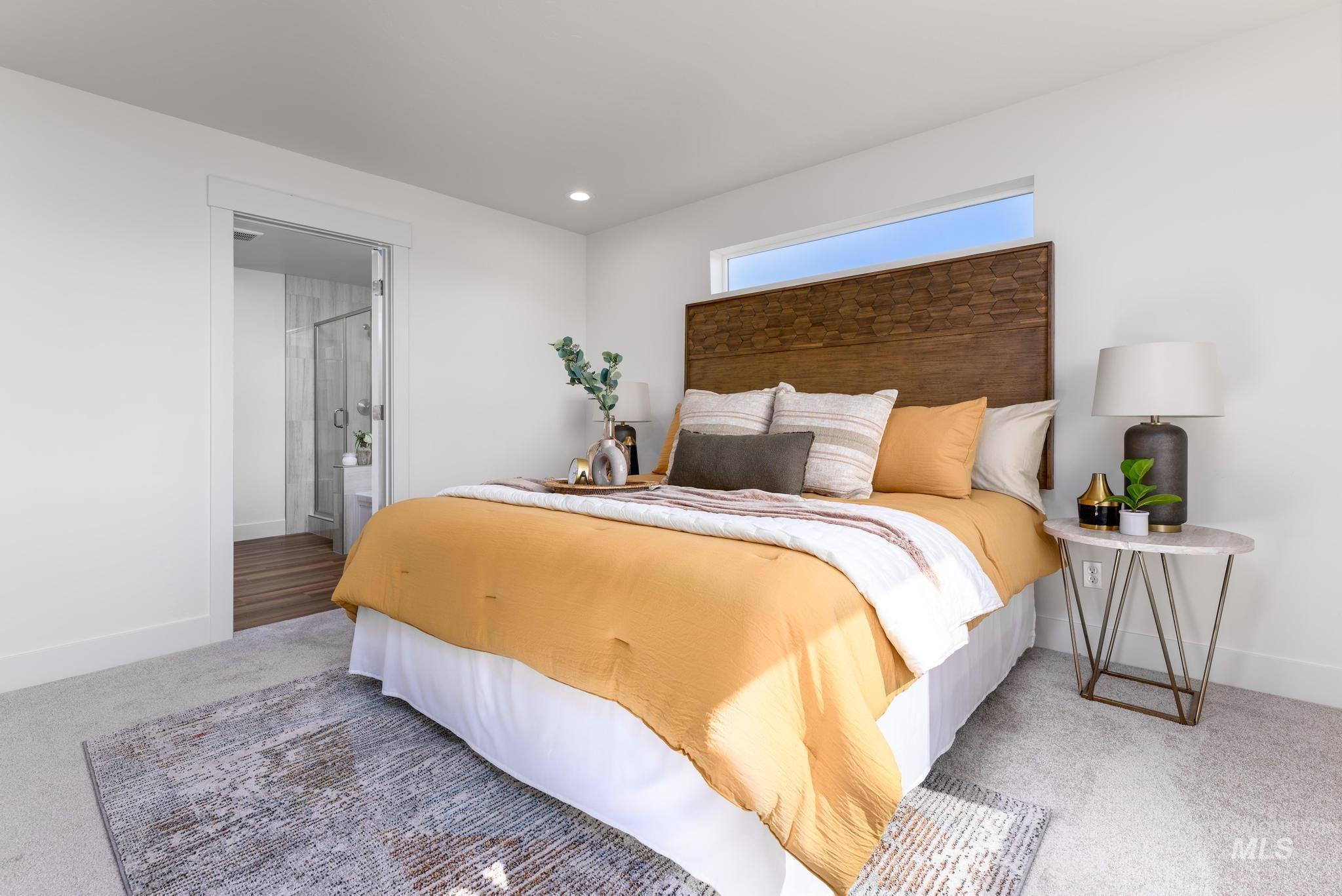 Bedroom featuring carpet floors, connected bathroom, and recessed lighting