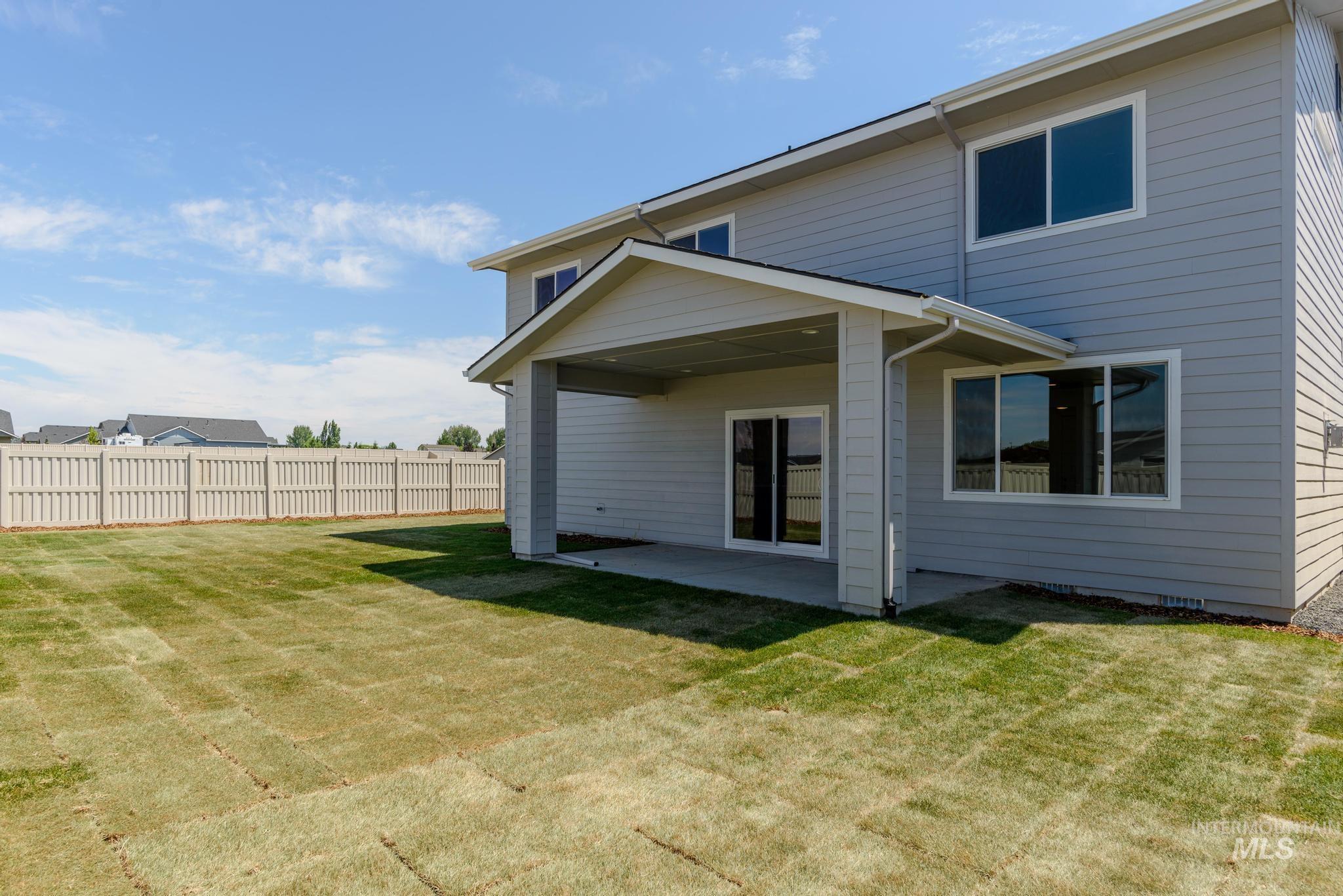 Back of house featuring a patio area