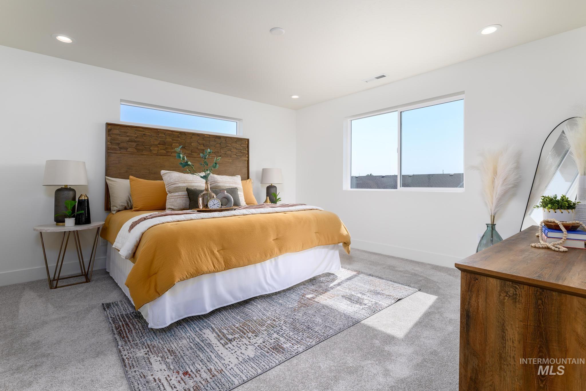 Bedroom featuring carpet and recessed lighting
