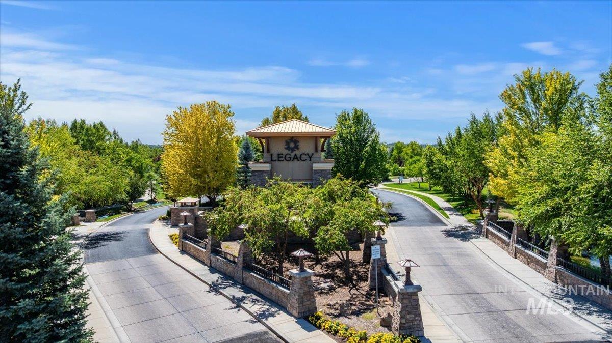 View of property's community featuring view of wooded area