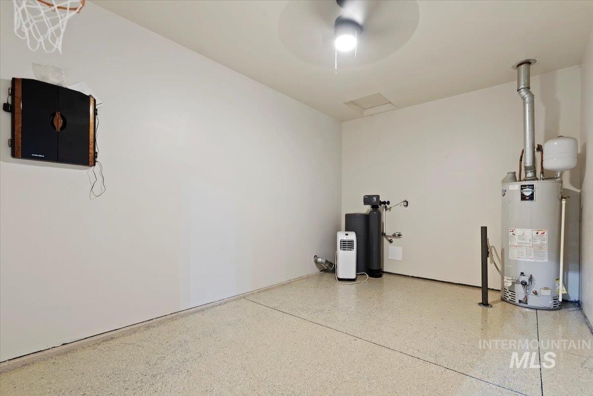 Utility room with gas water heater