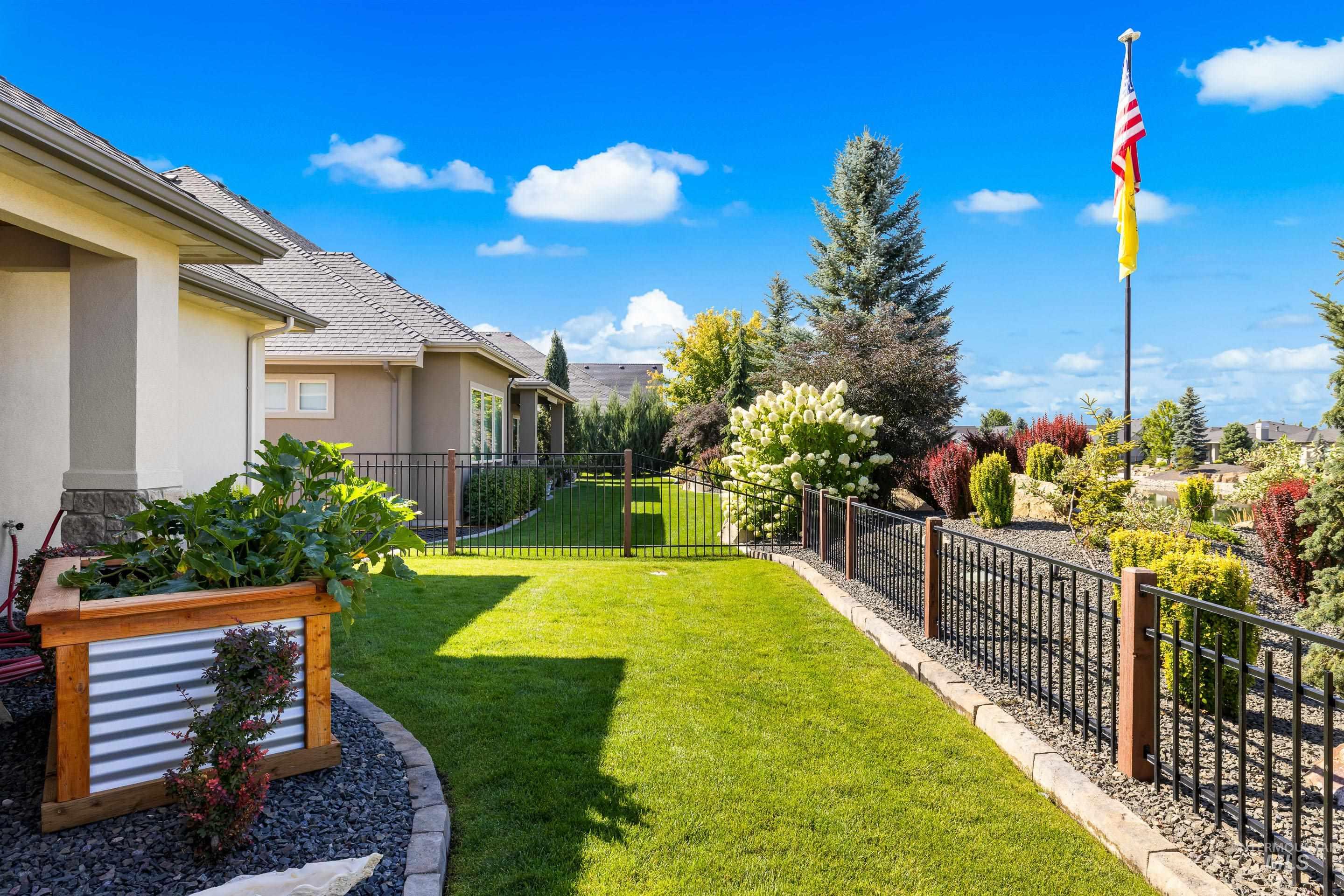 View of fenced backyard