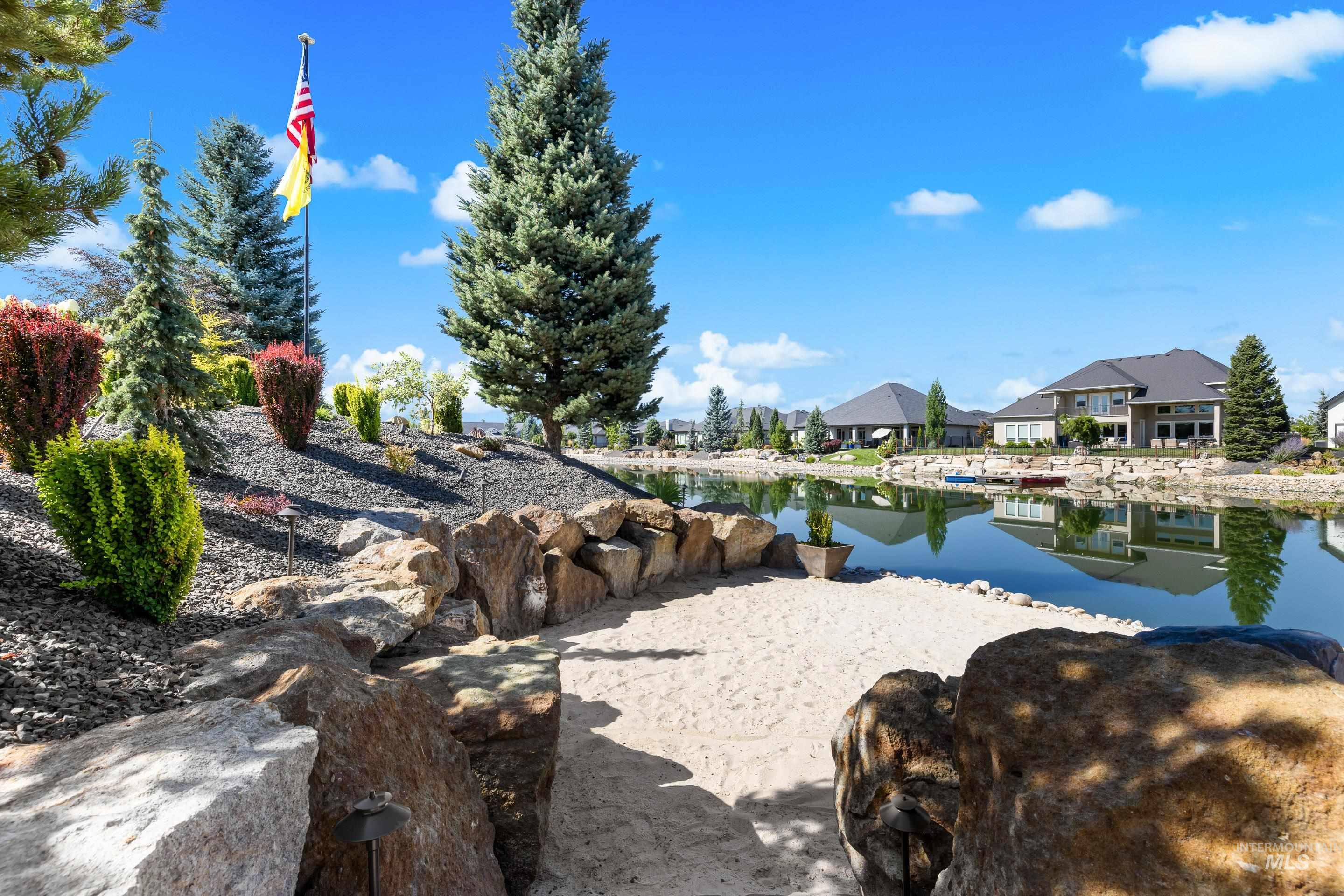Water view featuring nearby suburban area