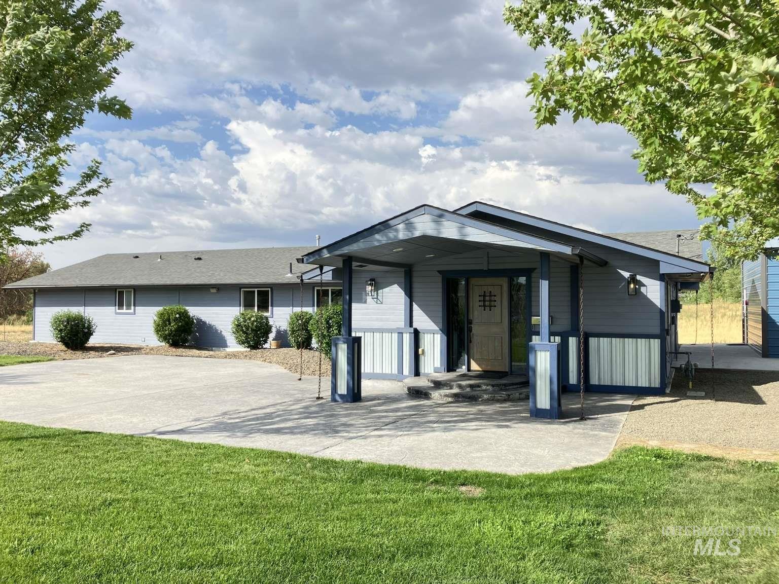 View of front of home featuring a front yard