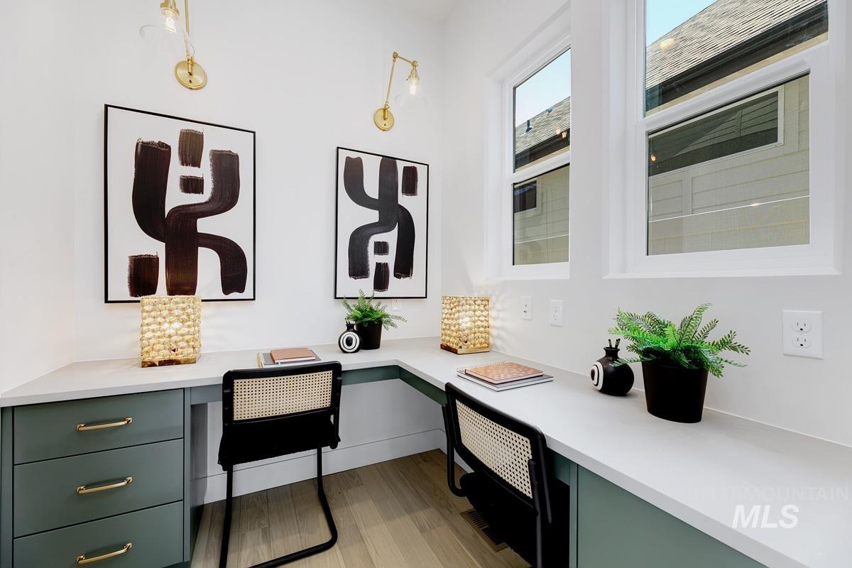 Detailed view of built in desk and wood finished floors