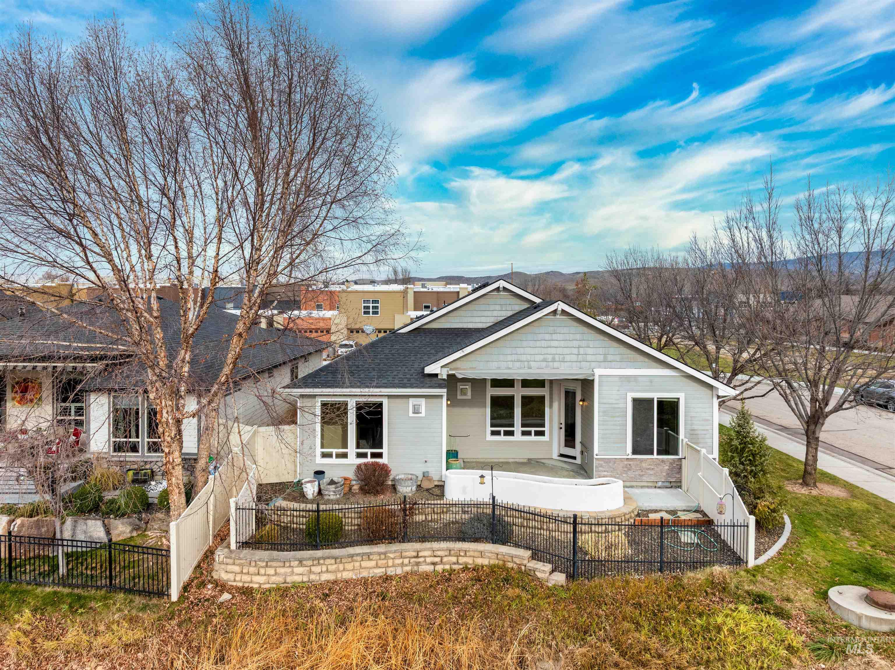 View of front facade with a fenced front yard