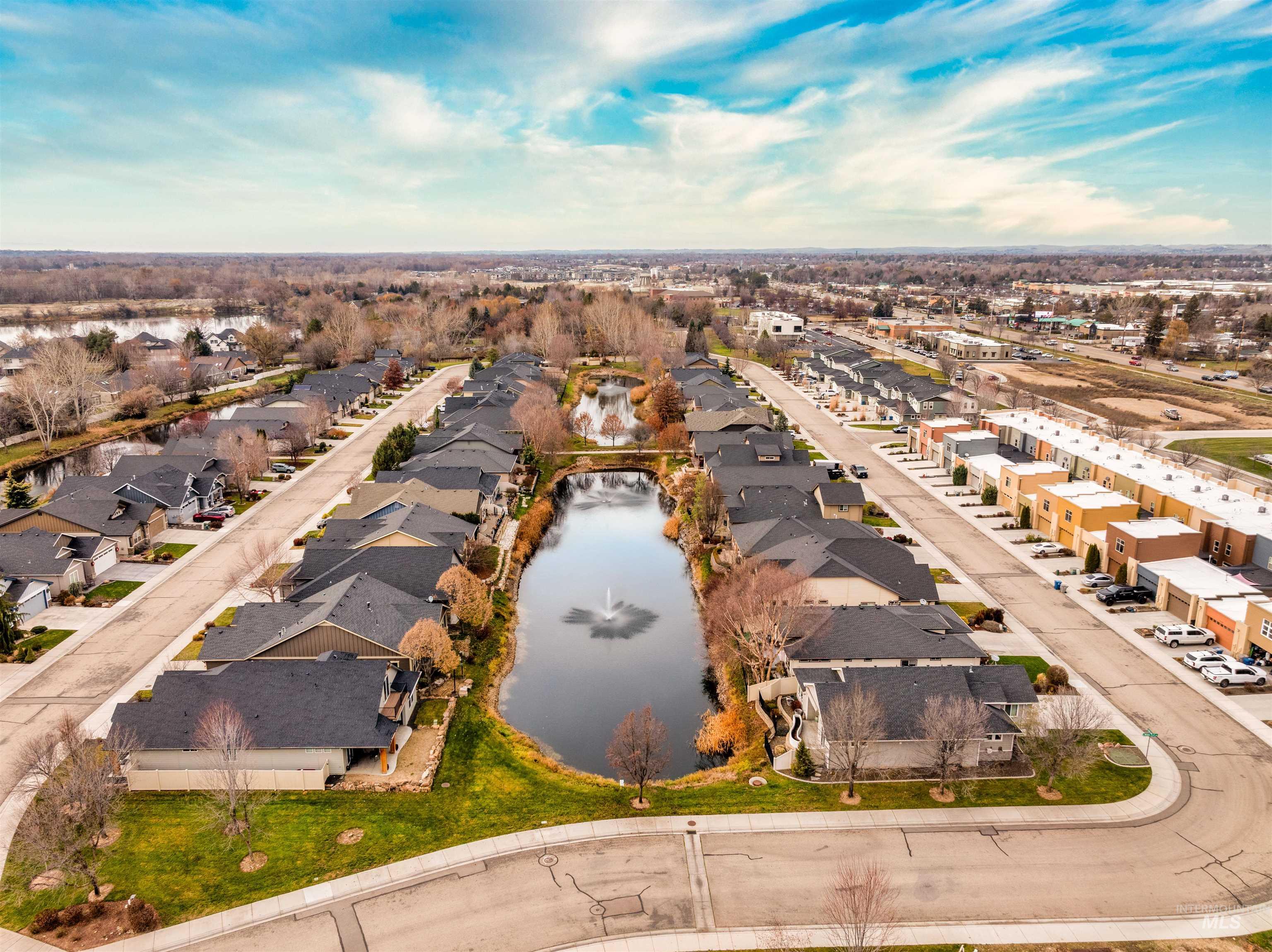Aerial view of residential area with a large body of water