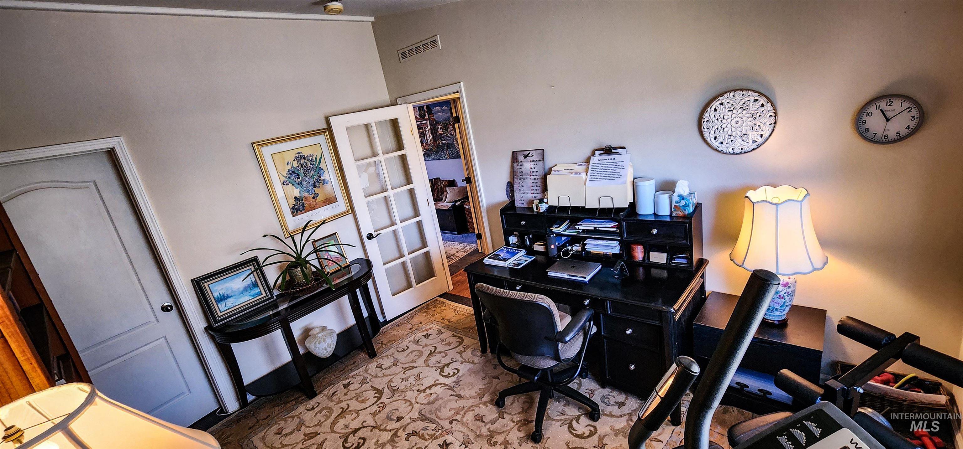 Office space featuring french doors