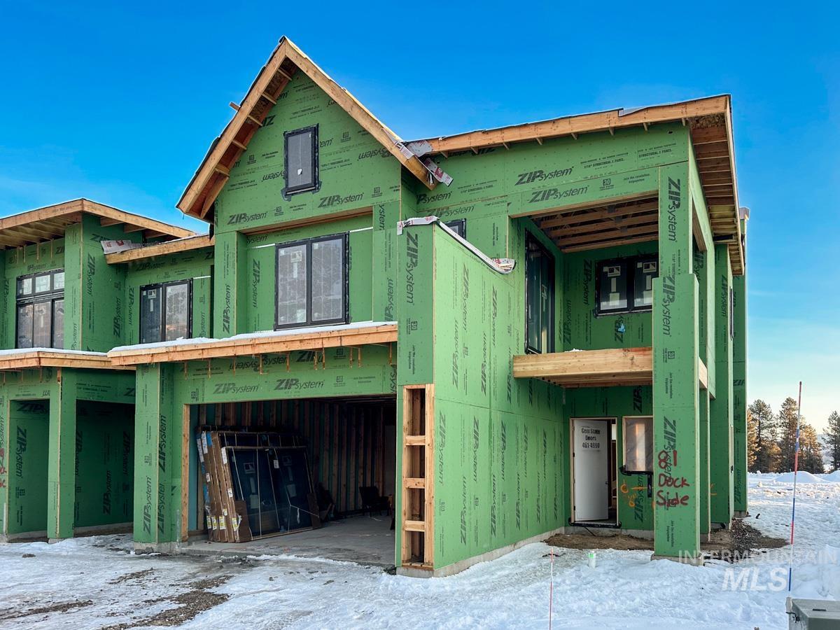 Unfinished property with a garage