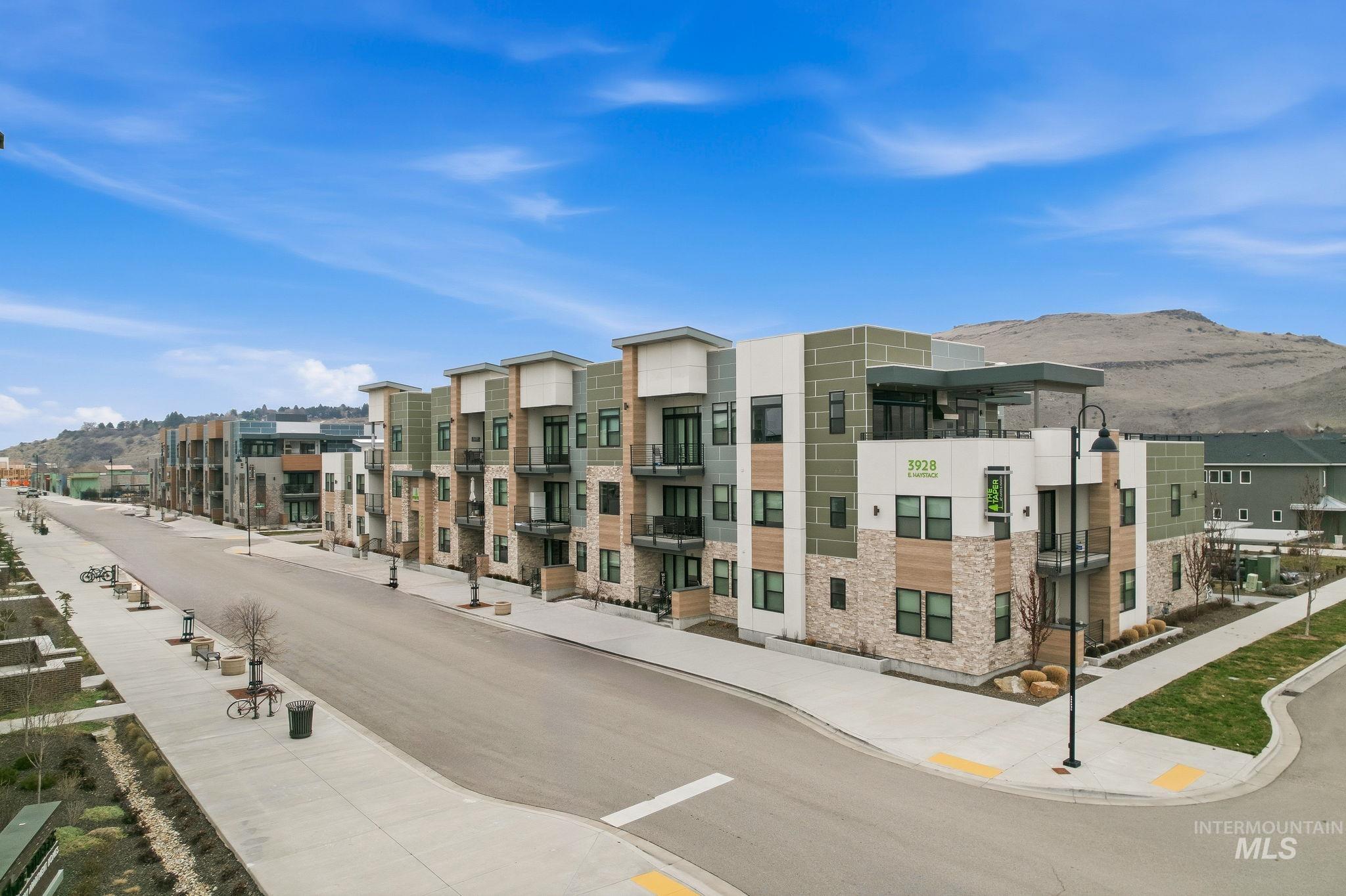 View of building exterior featuring a mountain view