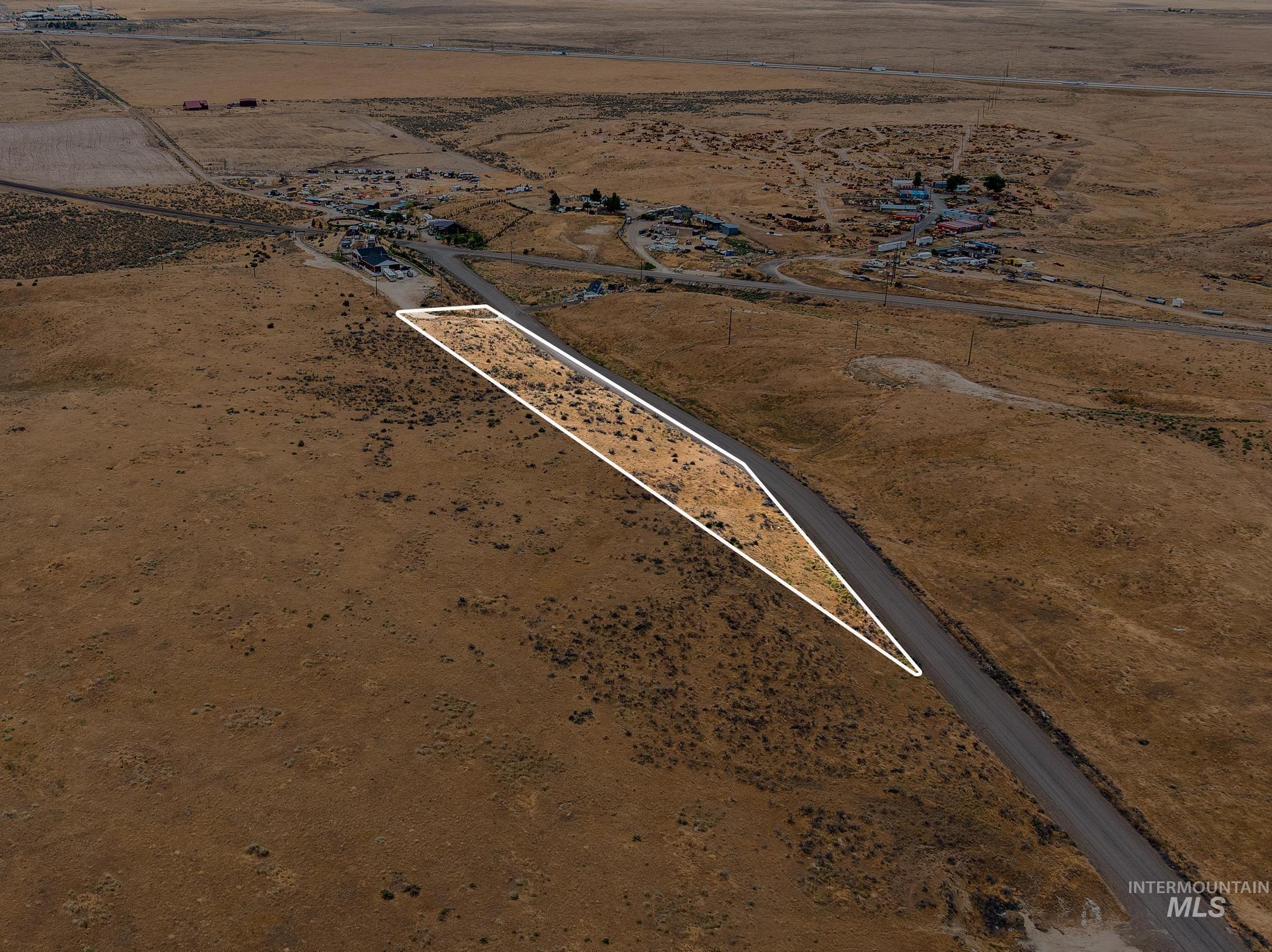 Expansive land parcel featuring natural desert vegetation