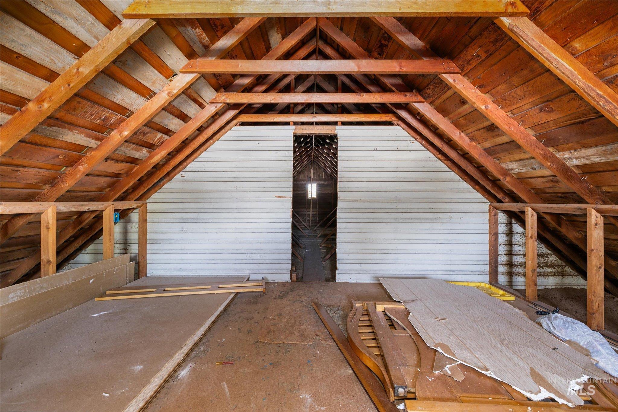 Vaulted ceiling with exposed wood beams