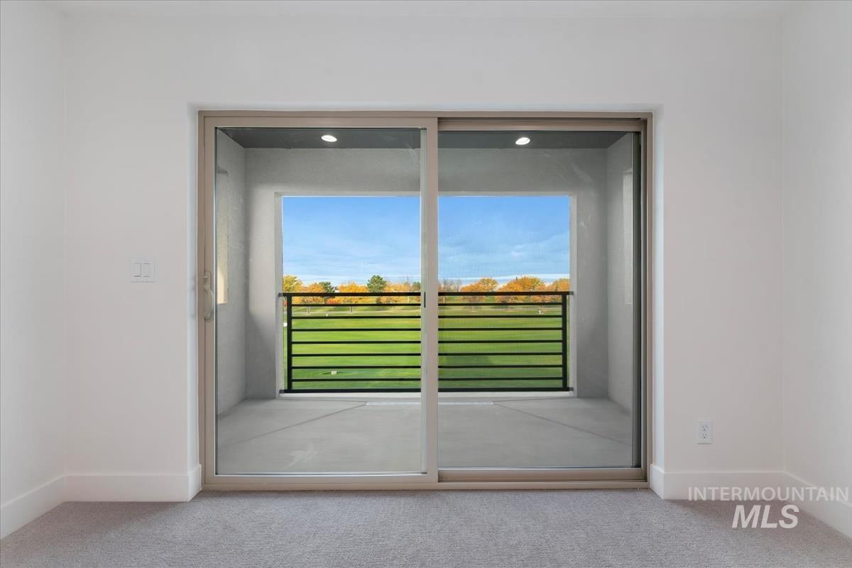 Interior space with carpet and baseboards
