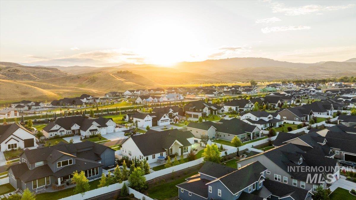 Aerial view at dusk of a mountain view and a residential view