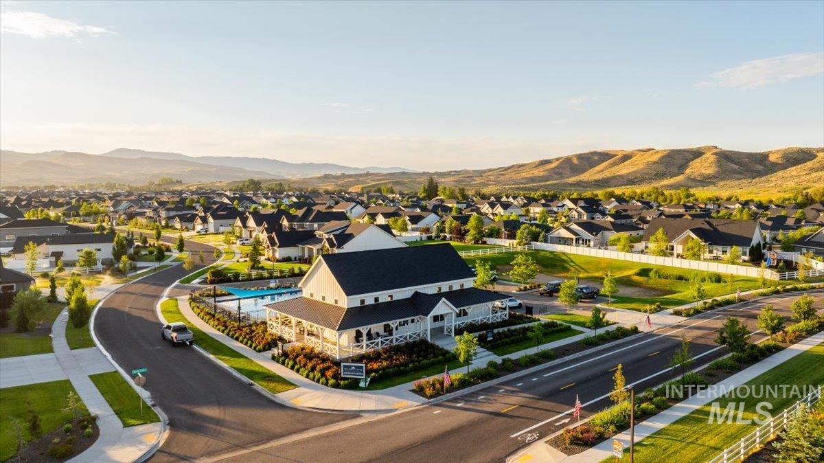 Aerial view of residential area with a mountainous background