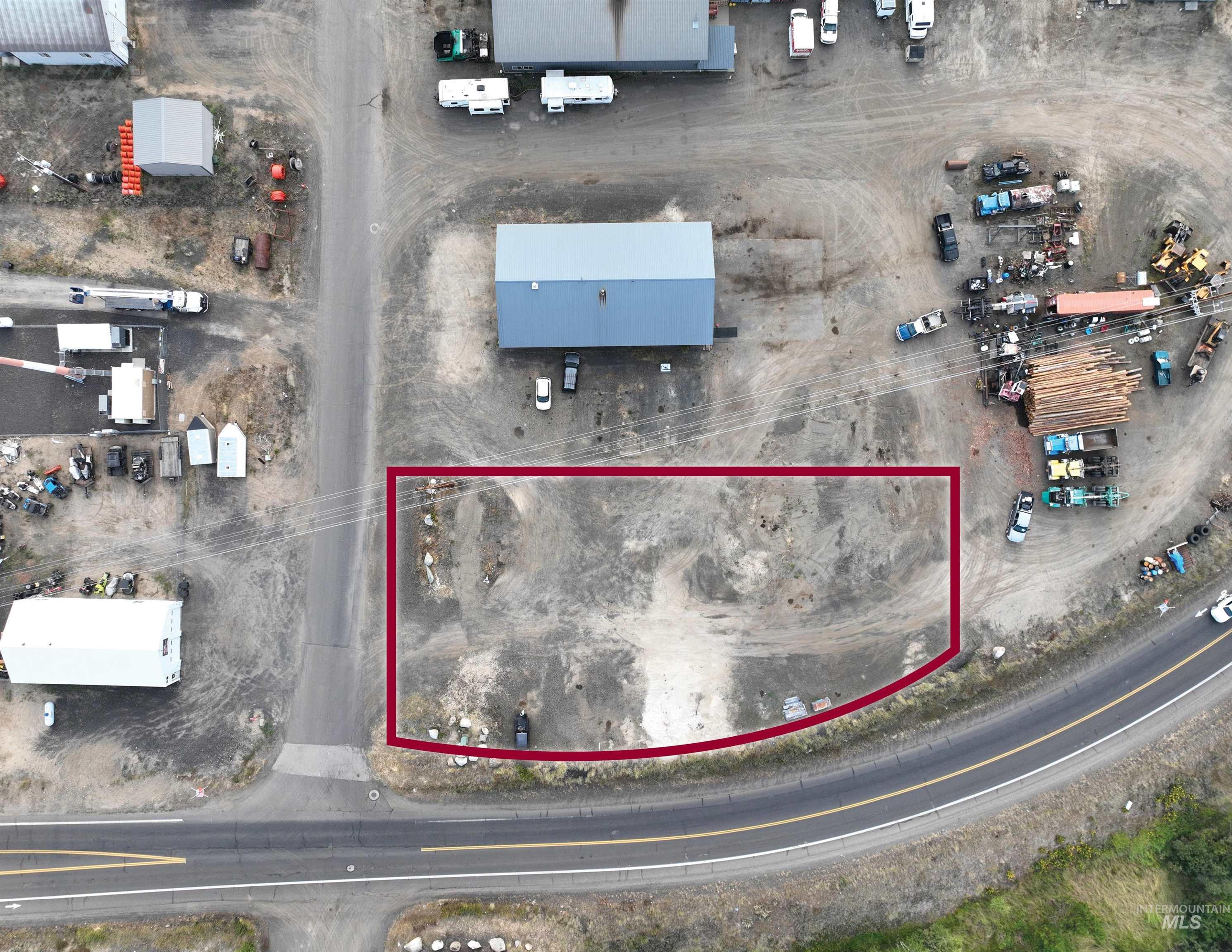 Aerial overview of property's location featuring property parcel outlined