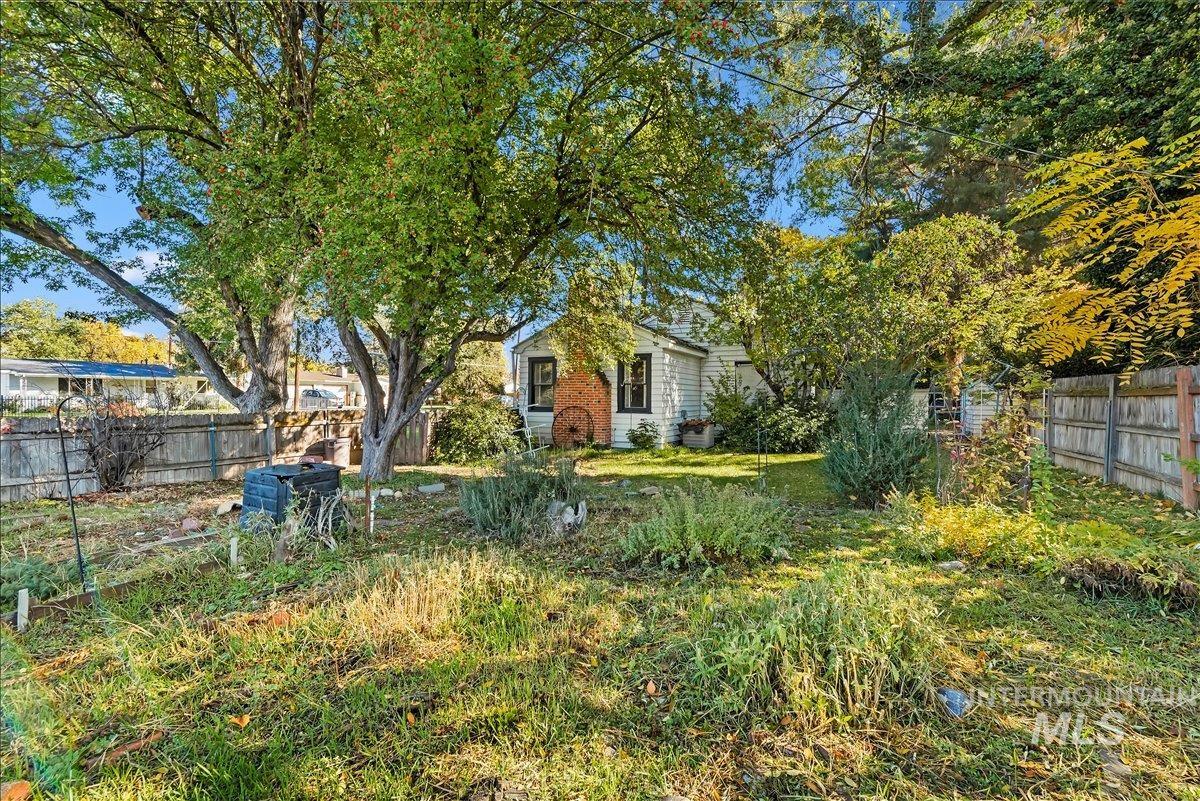 View of fenced backyard