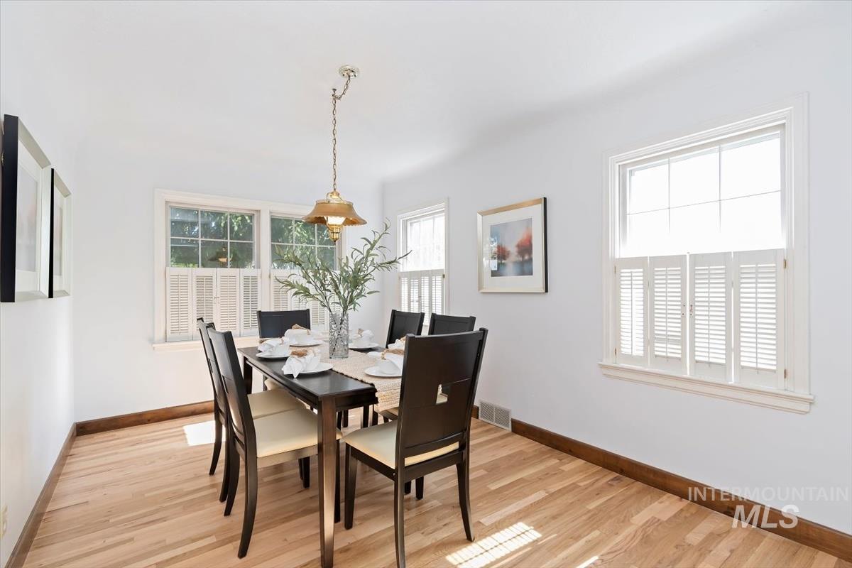 Dining room featuring light wood-type flooring