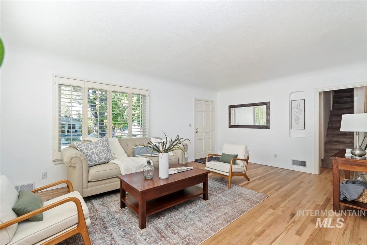 Living area featuring healthy amount of natural light and light wood-type flooring