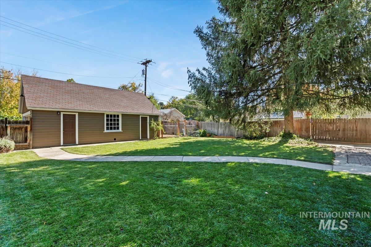 View of fenced backyard