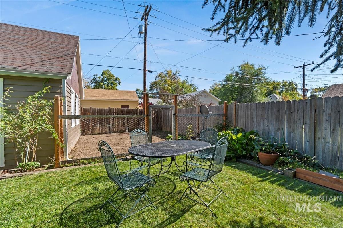 Fenced backyard featuring a patio area
