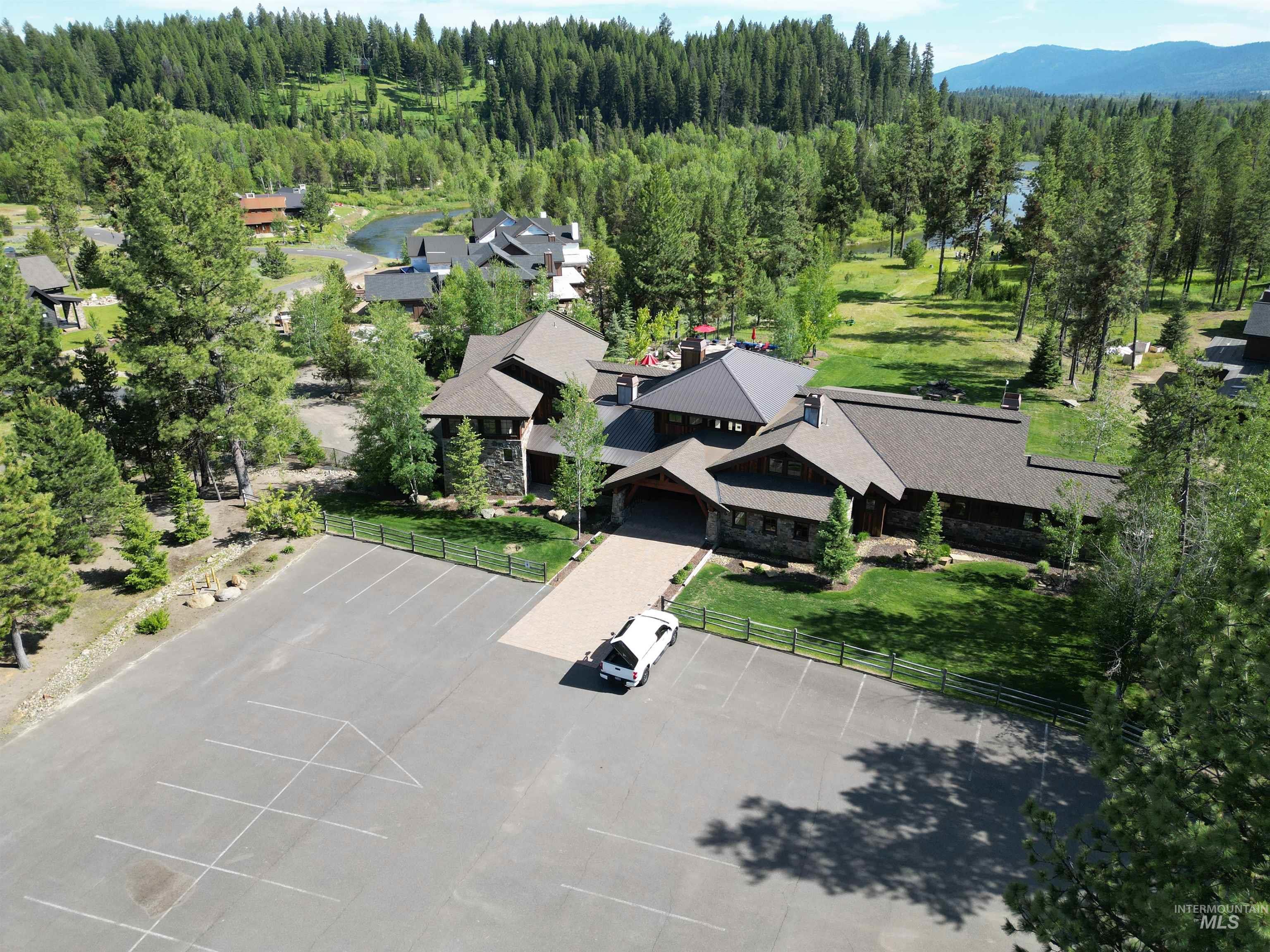 Aerial view of a heavily wooded area and mountains