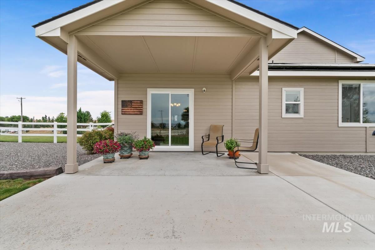 Rear view of house with a patio