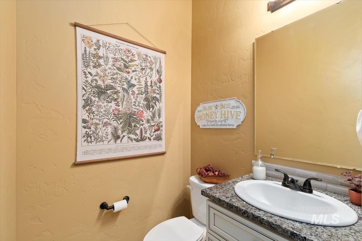 Bathroom with vanity and toilet