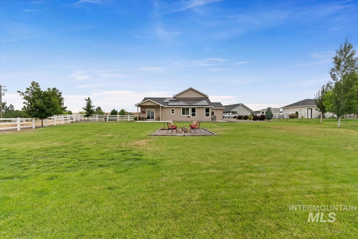 Fenced yard with a patio area
