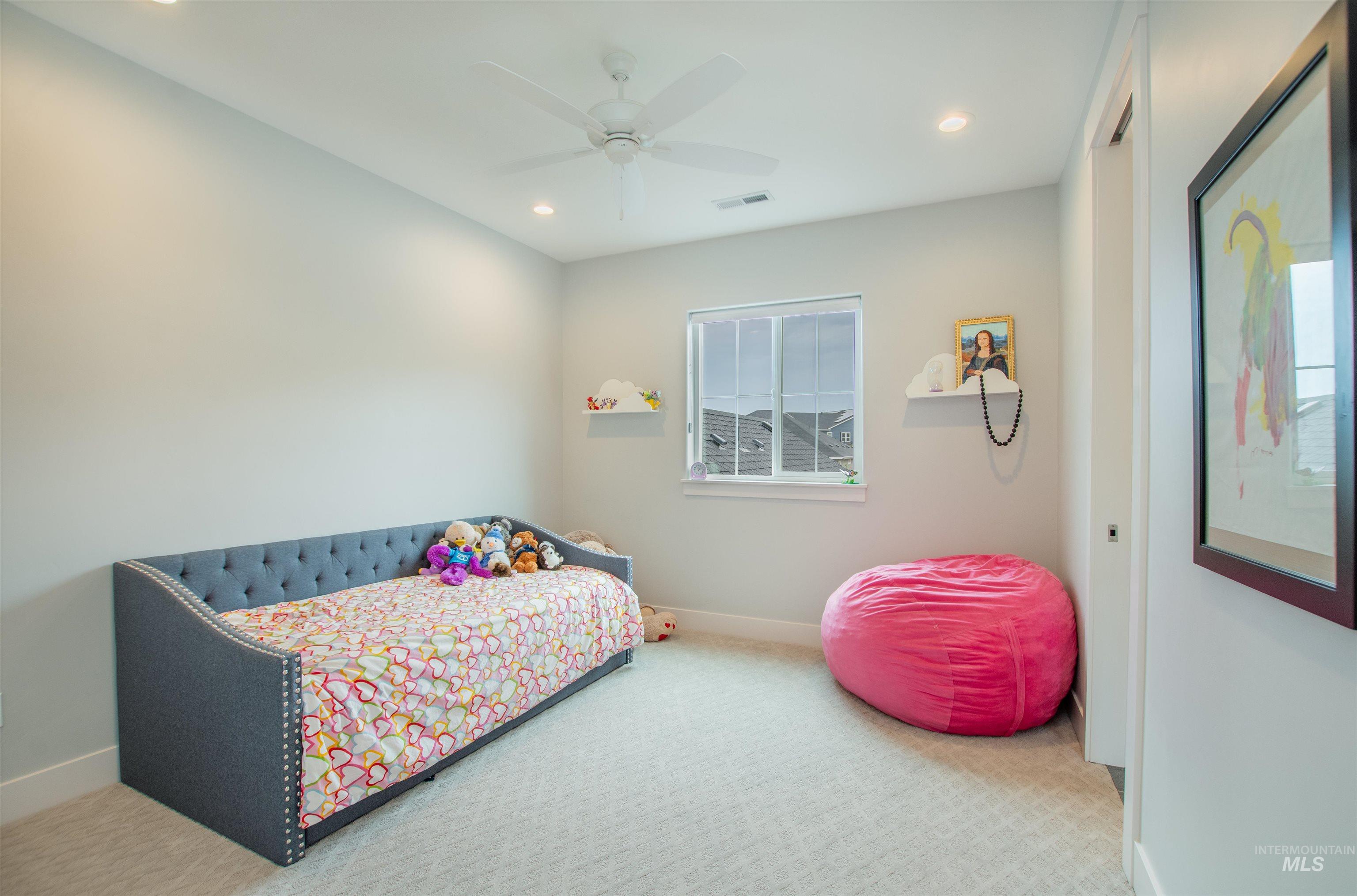 Bedroom featuring carpet flooring, recessed lighting, and a ceiling fan