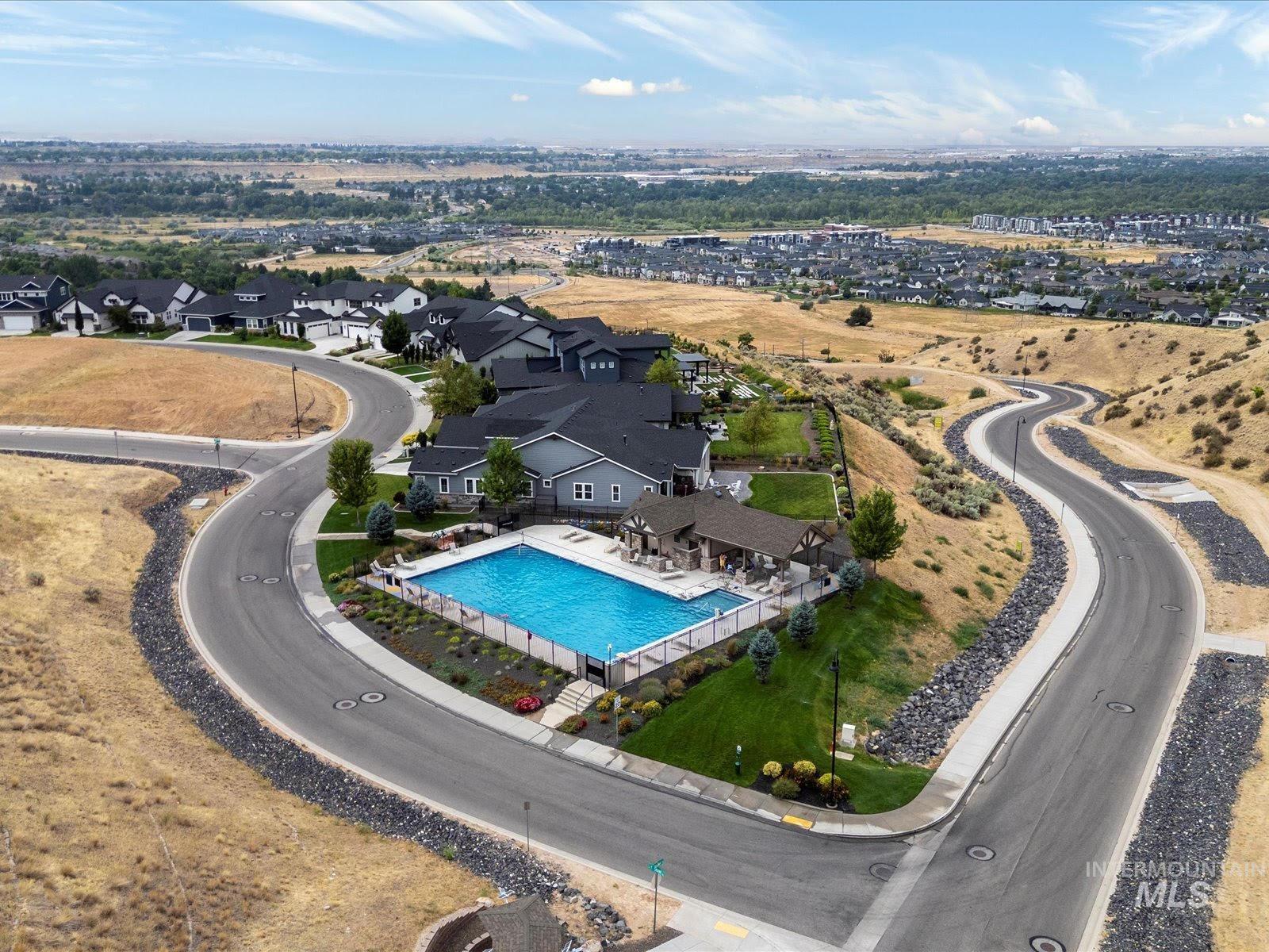 Aerial view of residential area with a pool area