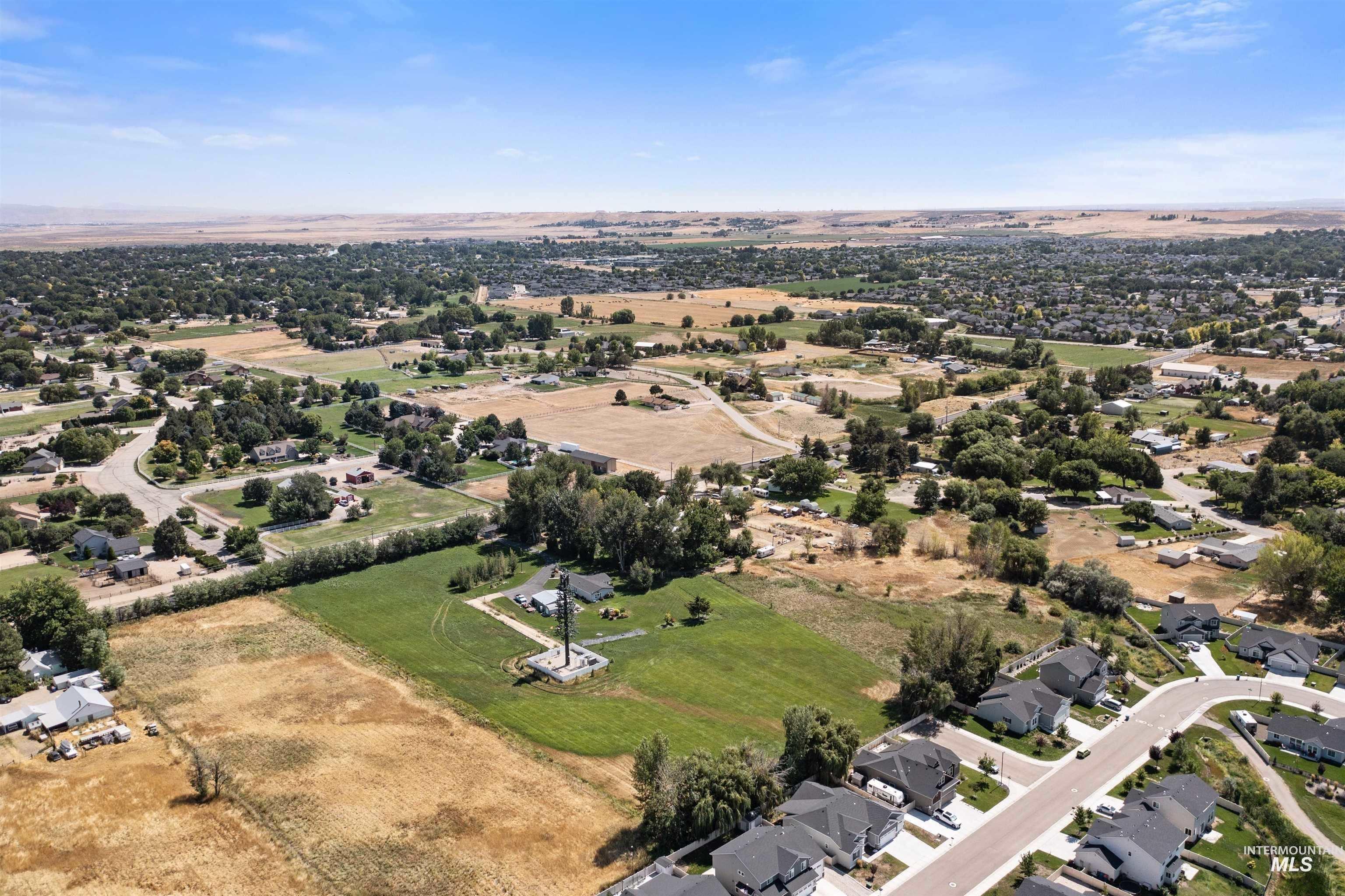 Aerial view of property's location featuring rural landscape