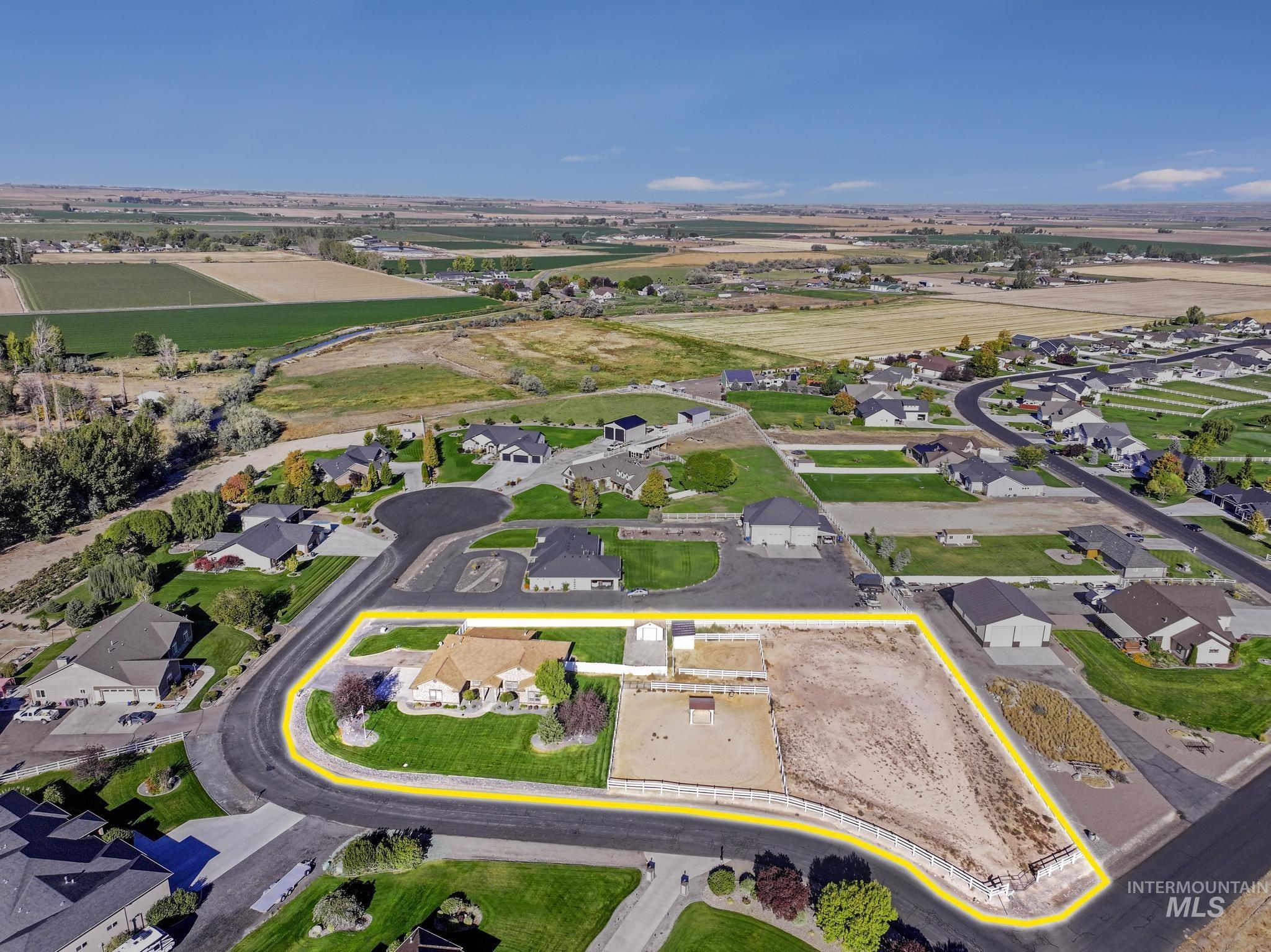 View of property location with nearby suburban area and property parcel outlined