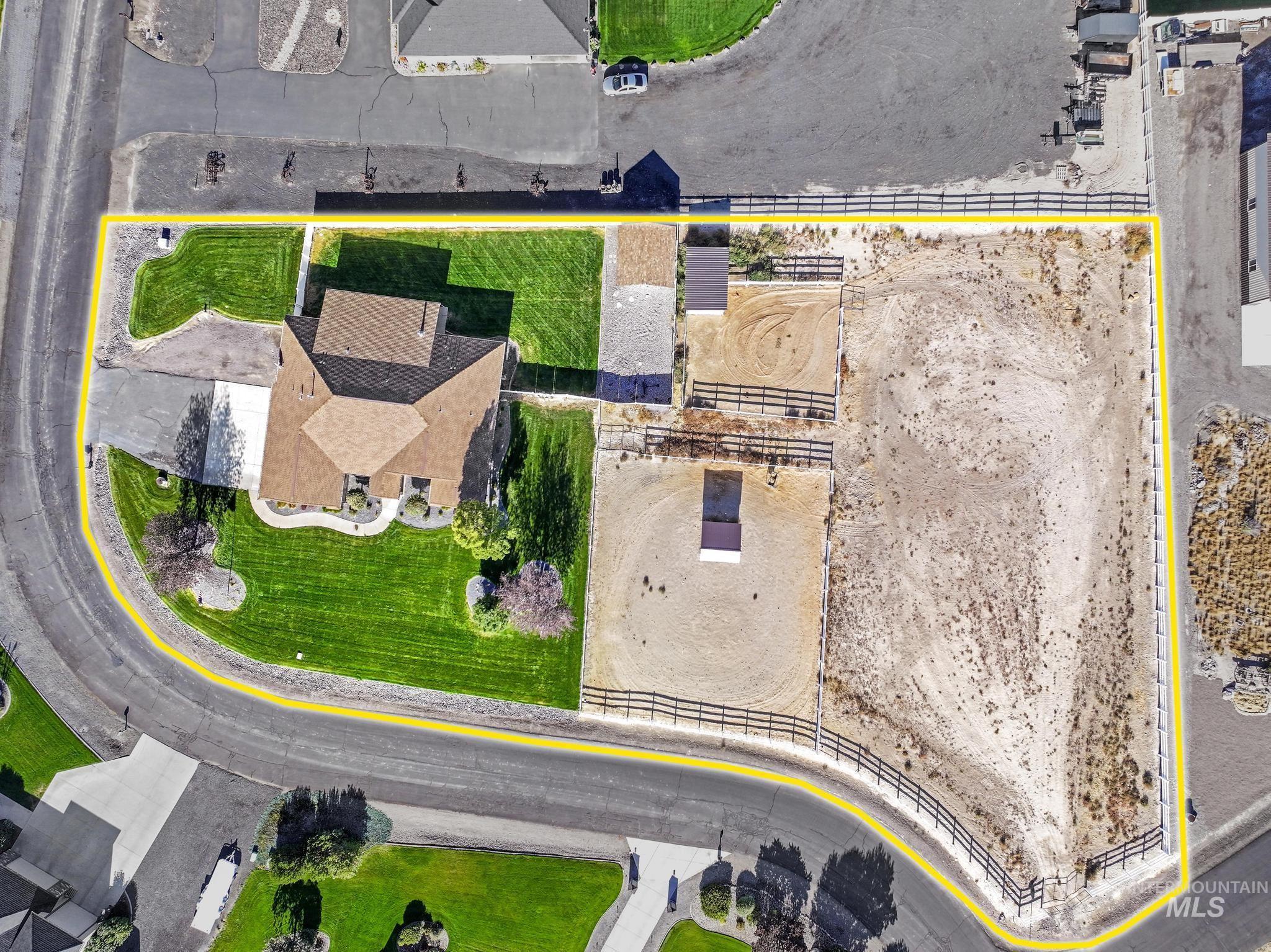 Aerial overview of property's location with property parcel outlined