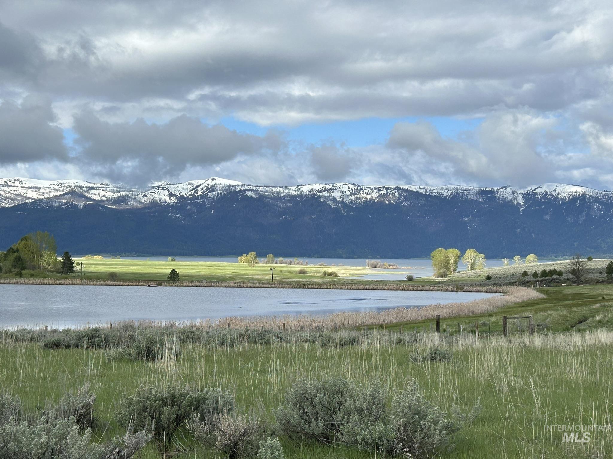 Mountain view featuring a nearby body of water