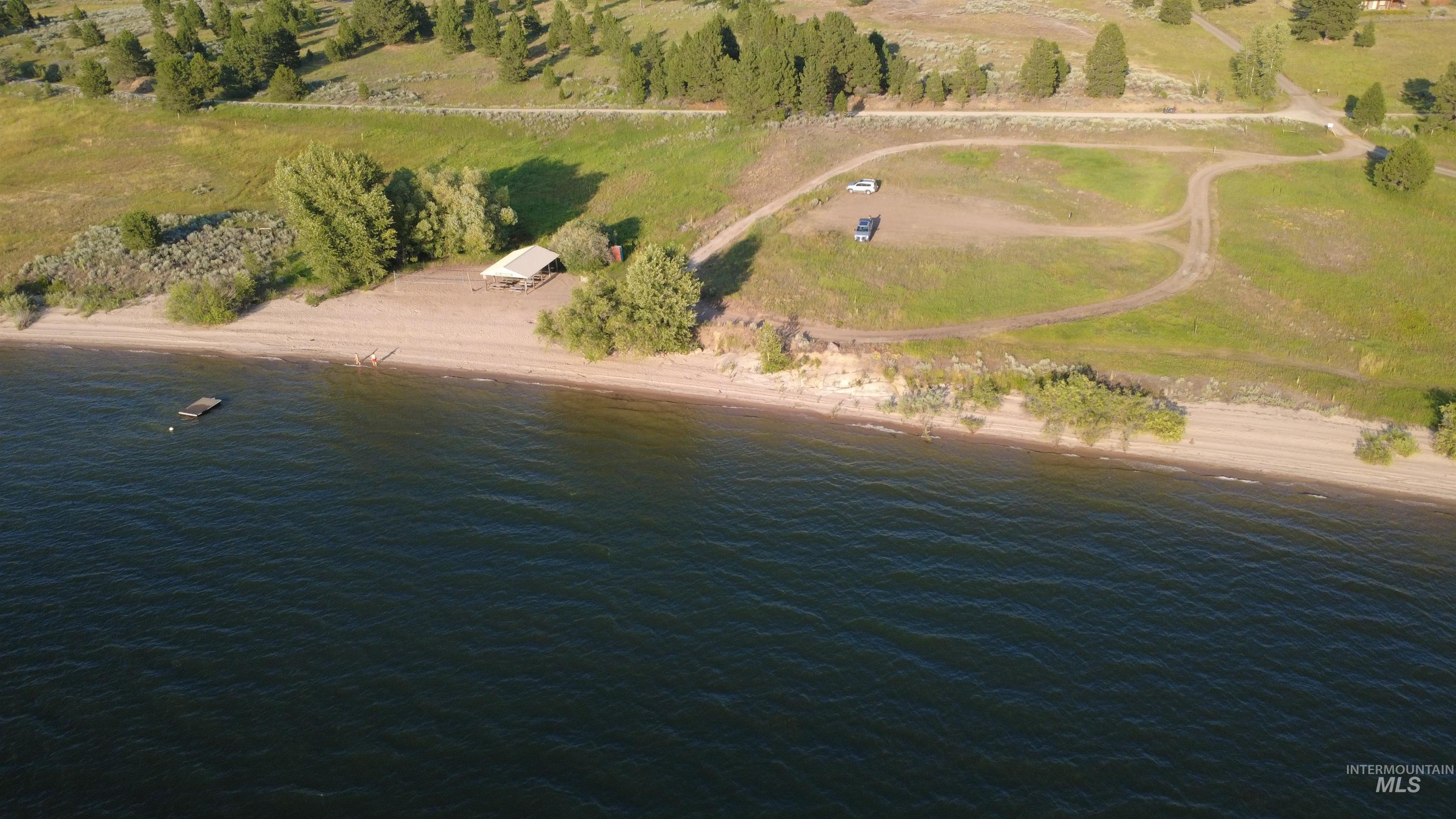 View of property location with a nearby body of water