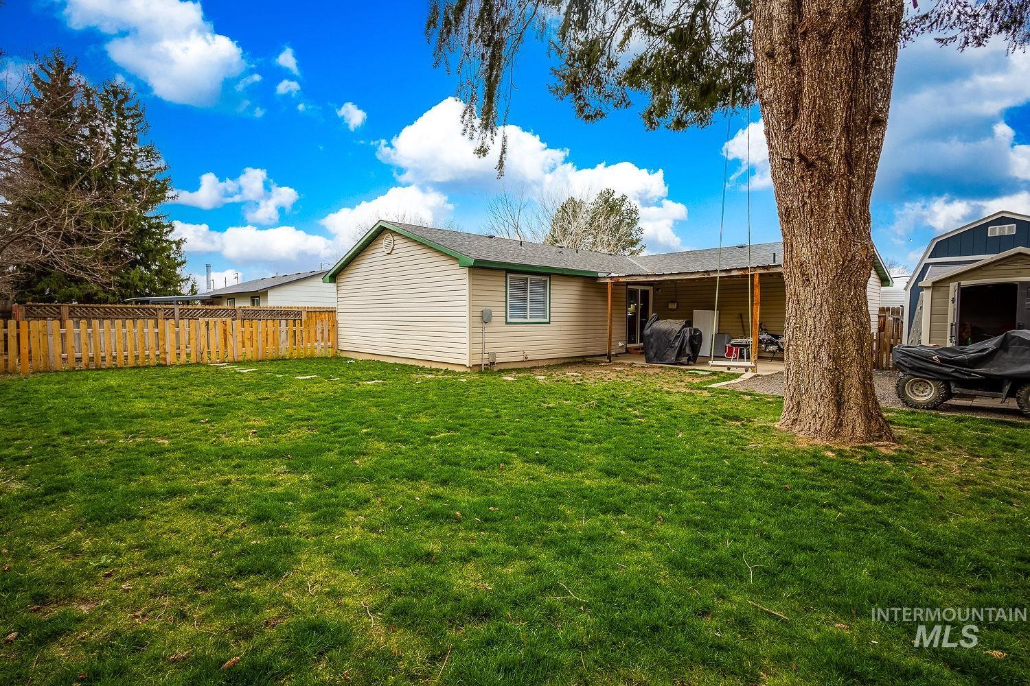 Rear view of house with a patio area