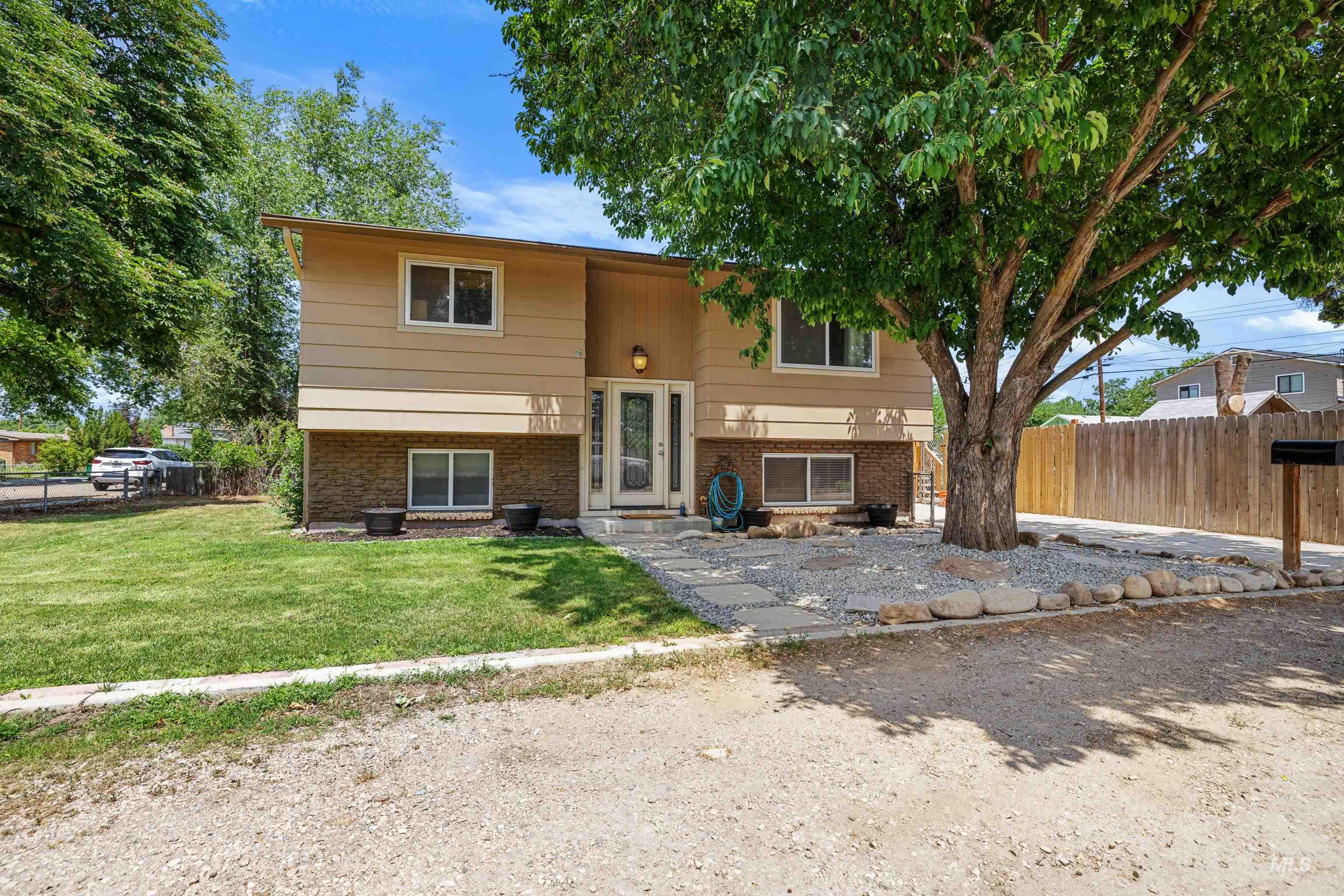 Split foyer home featuring brick siding