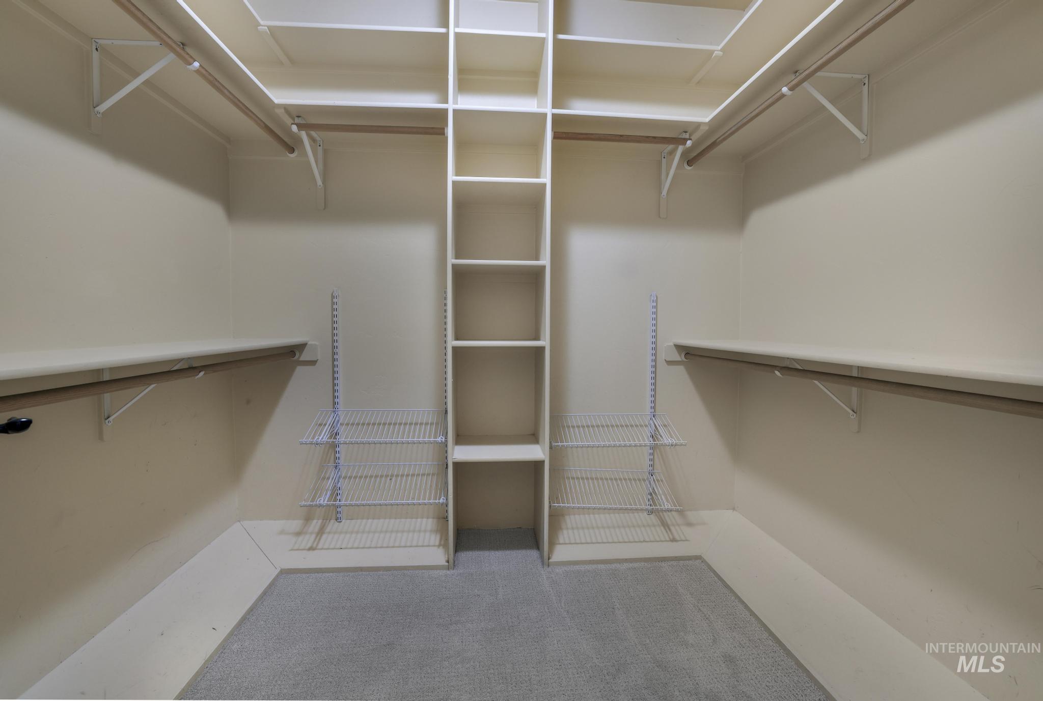 Walk in closet with new carpet