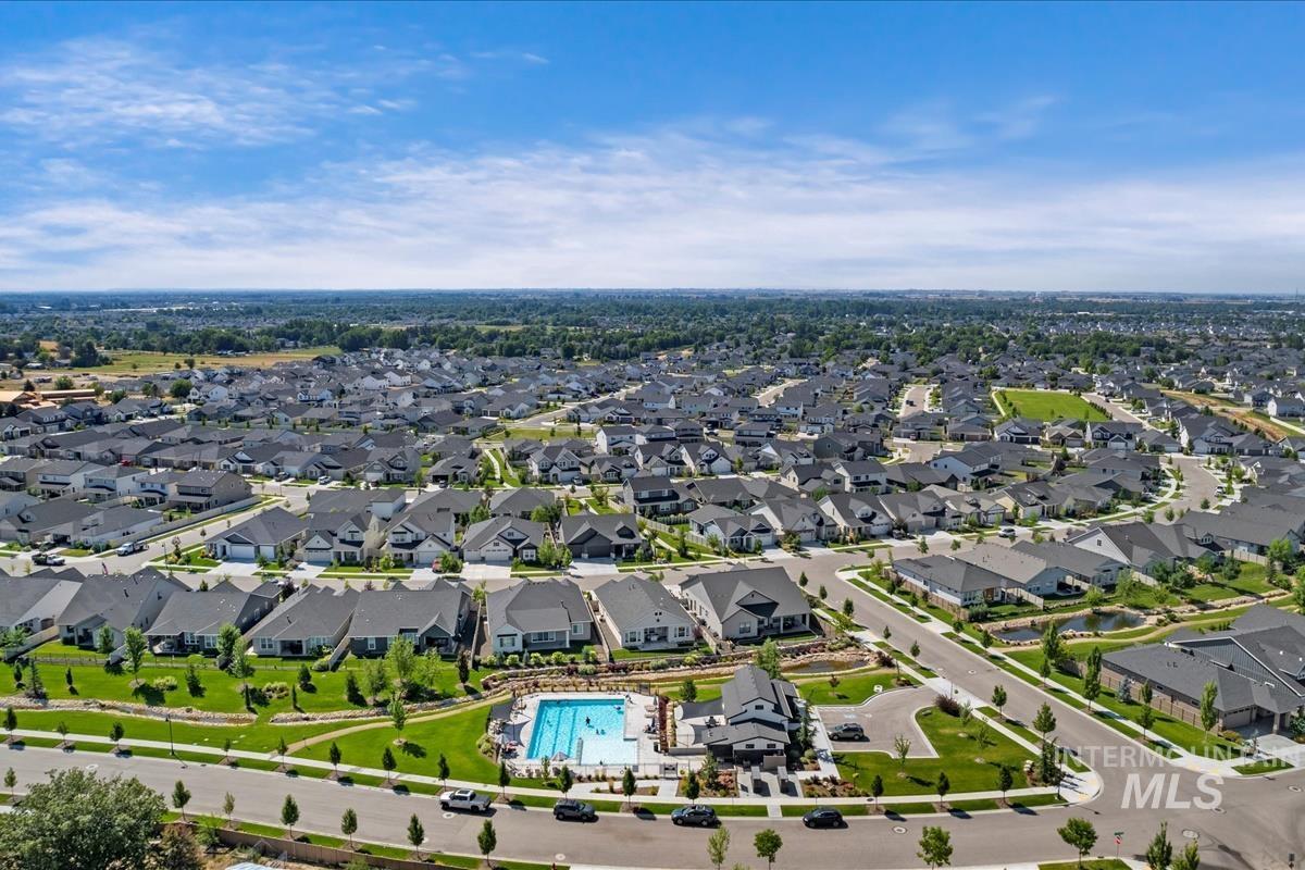 View of property location with nearby suburban area