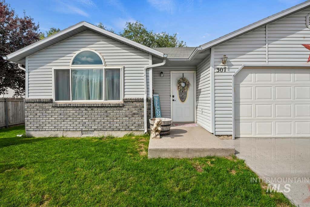 Photo of 307 Quail Cove Cir, Fruitland, ID 83619 (MLS # 98997478)