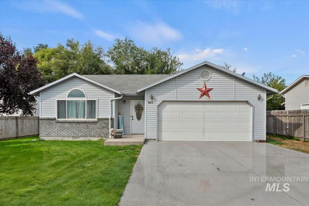 Photo of 307 Quail Cove Cir, Fruitland, ID 83619 (MLS # 98997478)