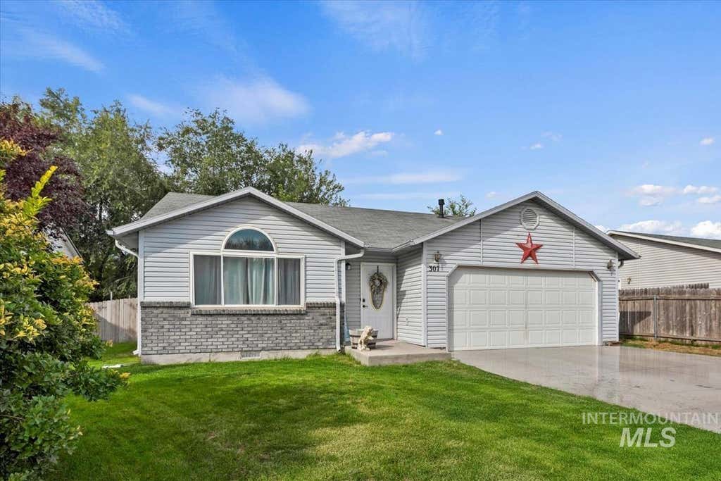 Photo of 307 Quail Cove Cir, Fruitland, ID 83619 (MLS # 98997478)