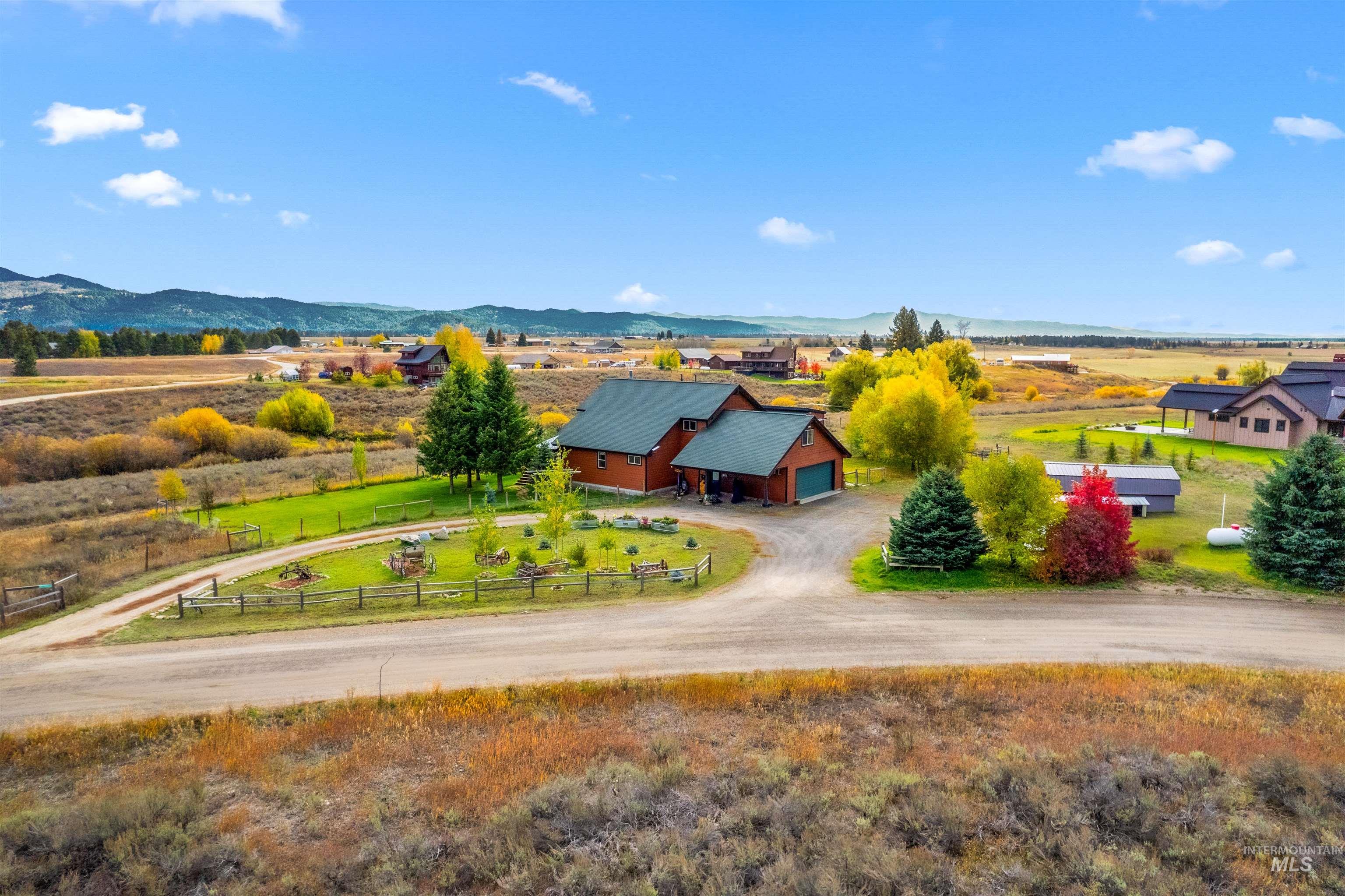 Overview of rural landscape featuring a mountain backdrop