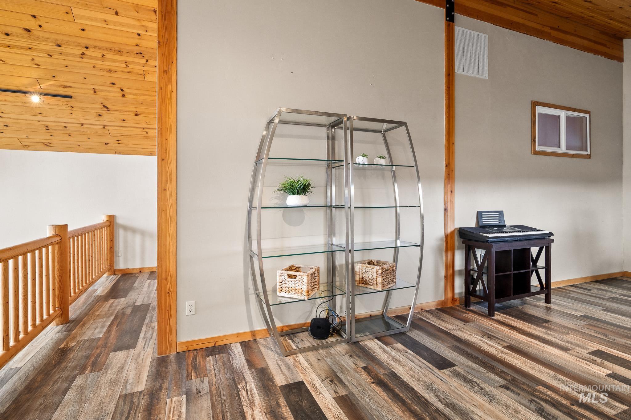 Detailed view of wood ceiling and wood finished floors