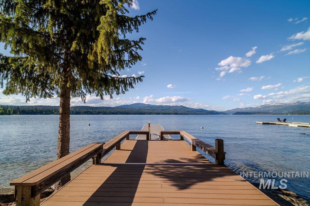 Private dock with wood-finish decking and integrated benches