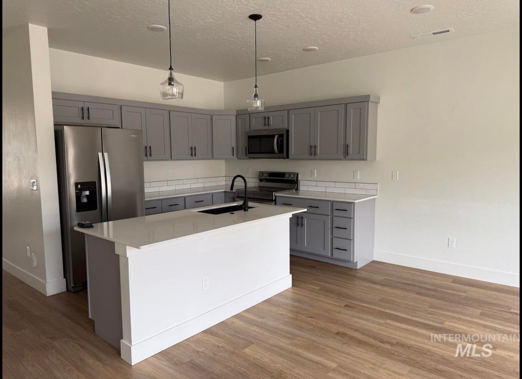 Photo of 127 N Trifect Lane, Nampa, ID 83651 (MLS # 98992012)