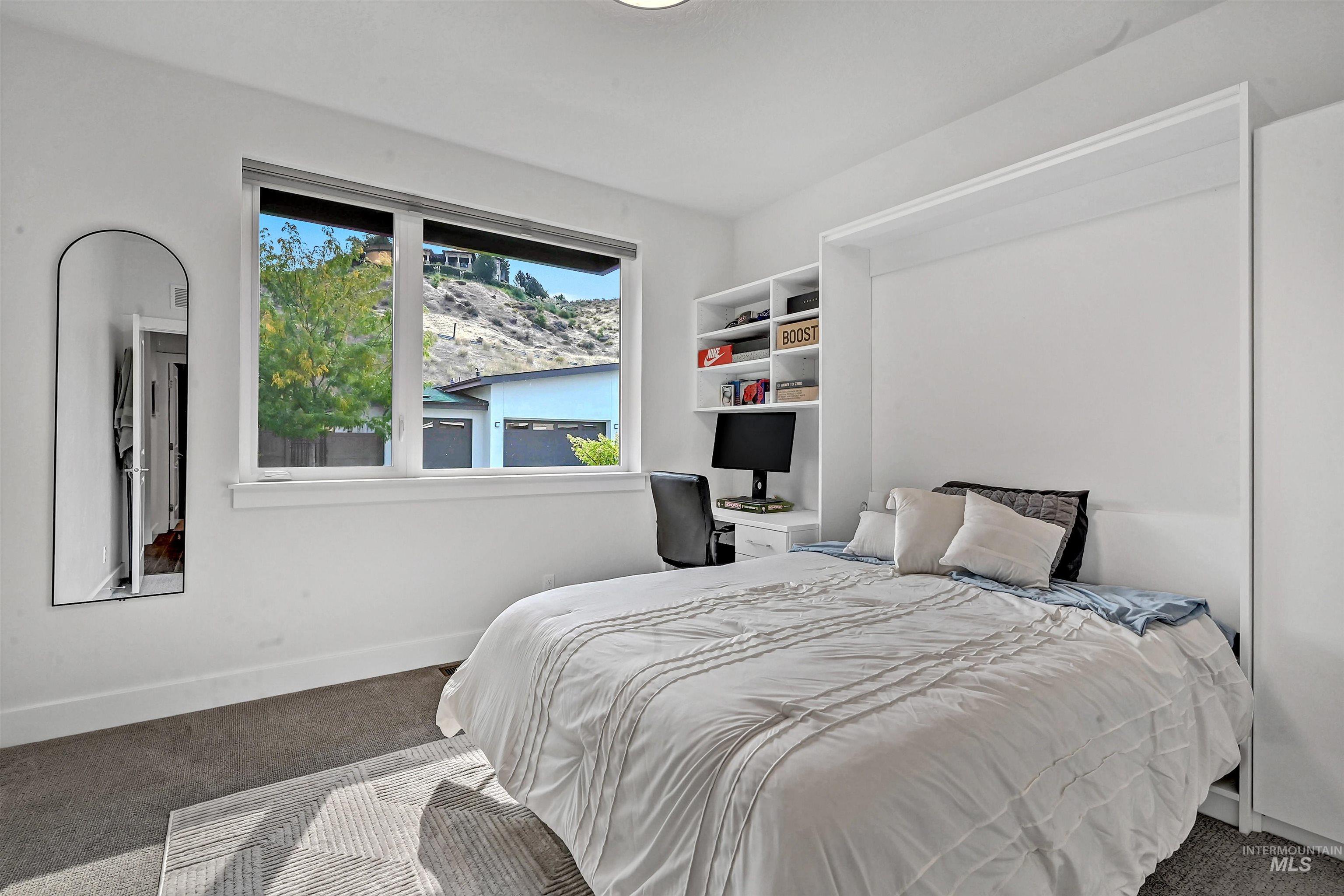 Bedroom featuring carpet floors