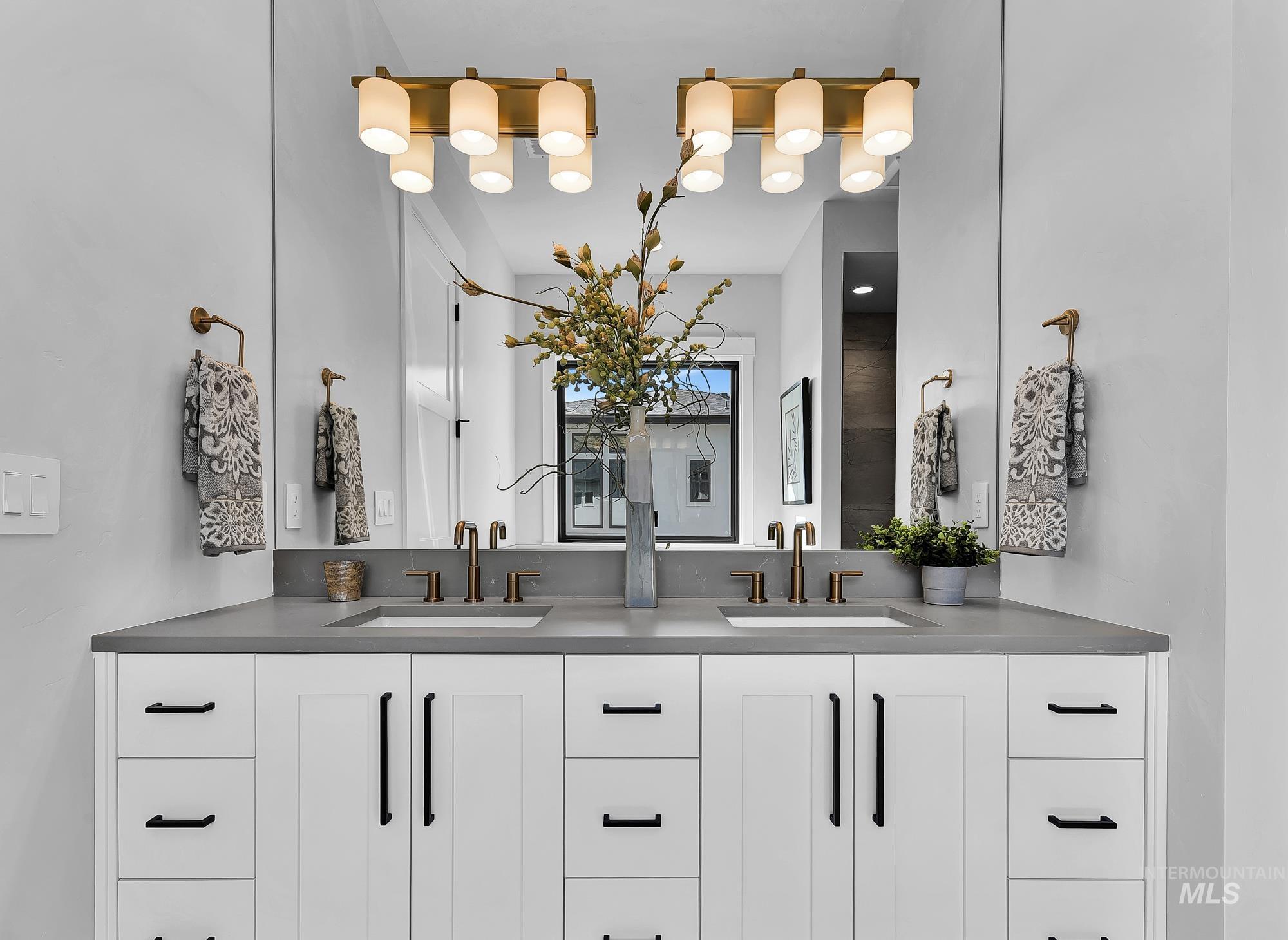 Bathroom featuring double vanity