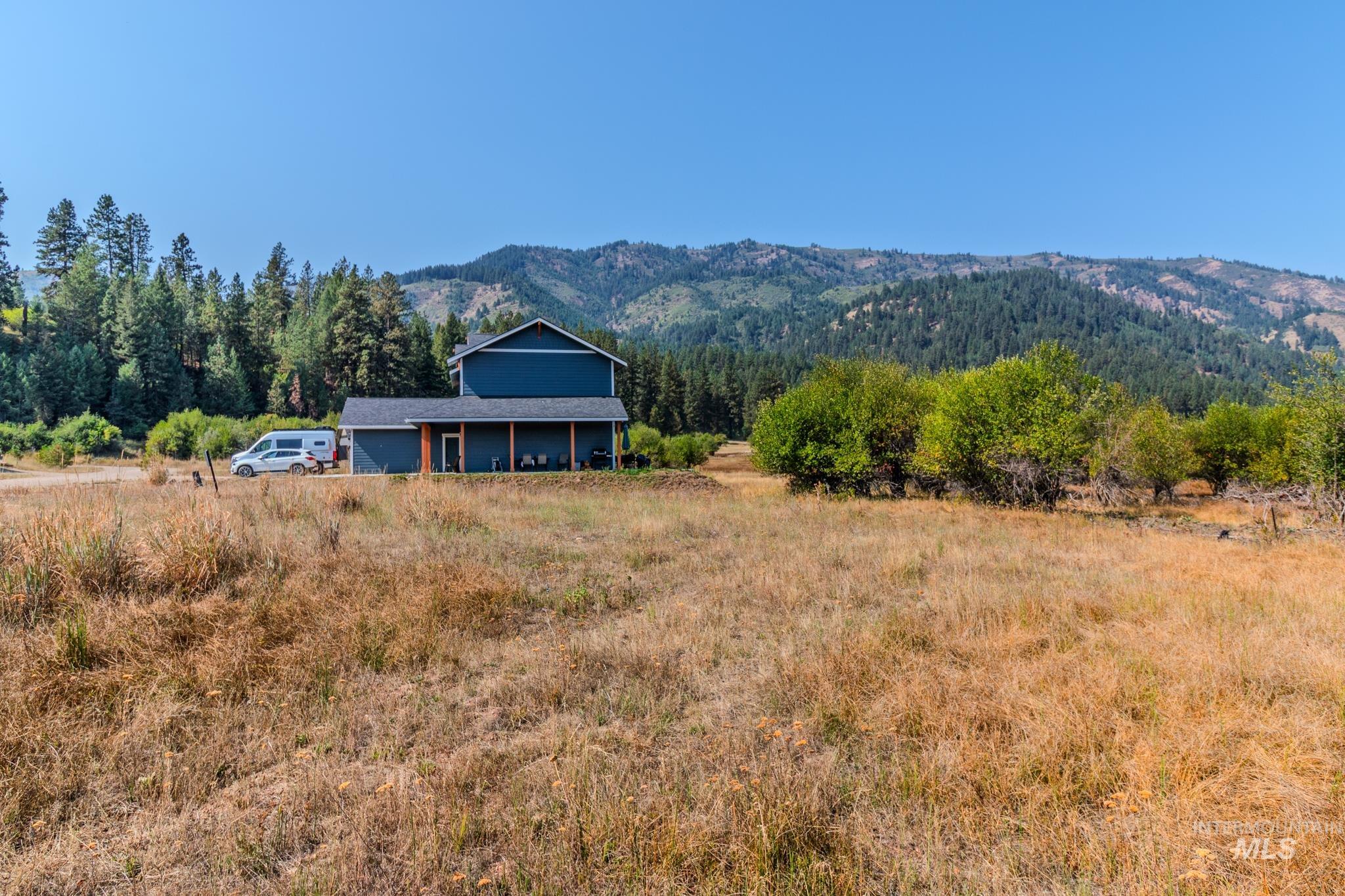 Mountain view with rural landscape and a heavily wooded area